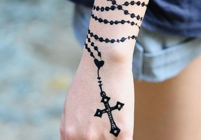 rosary-tattoo-on-wrist-for-girl